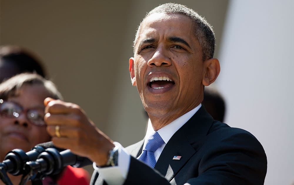 President Barack Obama gestures as he speaks in the Rose Garden of the White House in Washington, about the government shutdown.