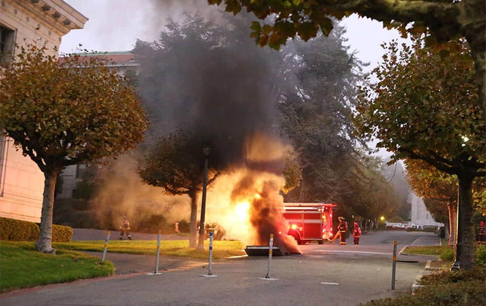 This image provided by The Daily Californian shows fire and smoke from an explosion on the University of California Berkeley campus, in Berkeley, Calif.