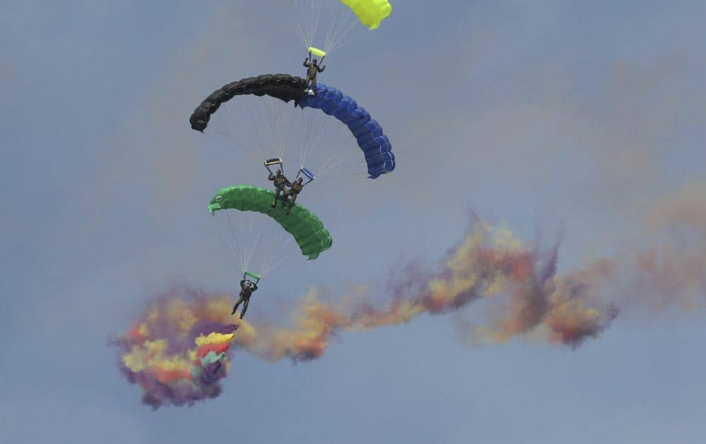 South Korean Special Army soldiers parachute during the 65th anniversary of the Armed Forces Day ceremony at Seoul military airport in Seongnam.