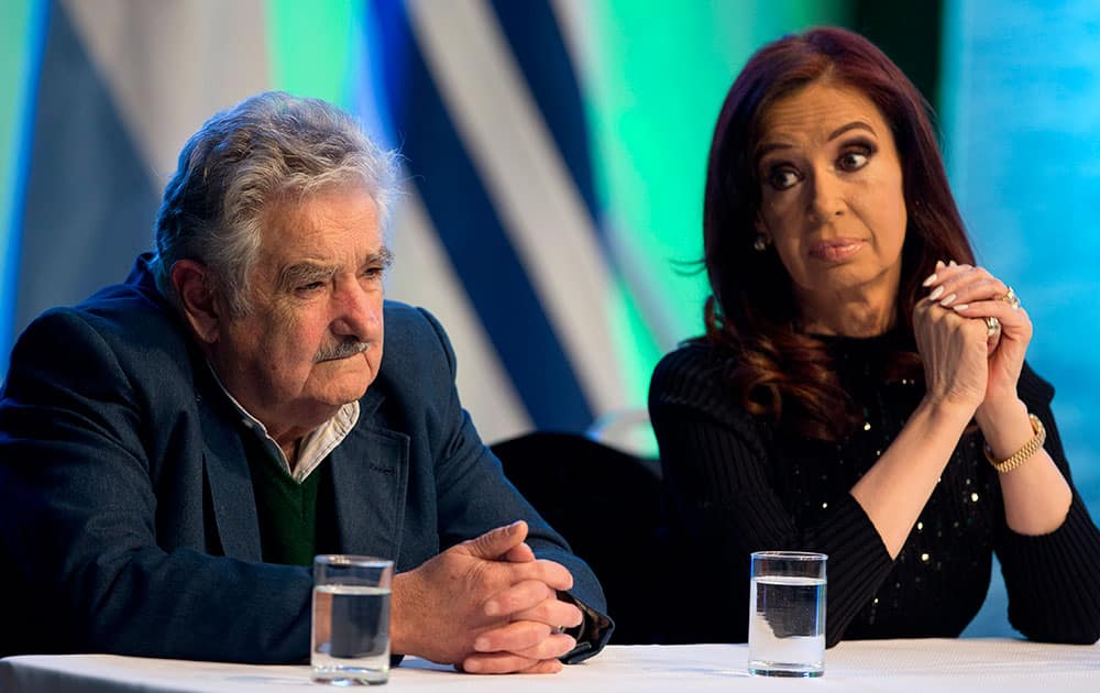Argentina`s President Cristina Fernandez and Uruguay`s President Jose Mujica attend a ceremony to launch a new catamaran ferry between Montevideo and Buenos Aires in Buenos Aires, Argentina.