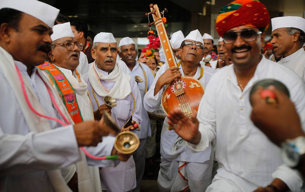 Supporters of India’s opposition Bharatiya Janata party (BJP) leader Narendra Modi sing at a public rally addressed by Modi in Mumbai, India.