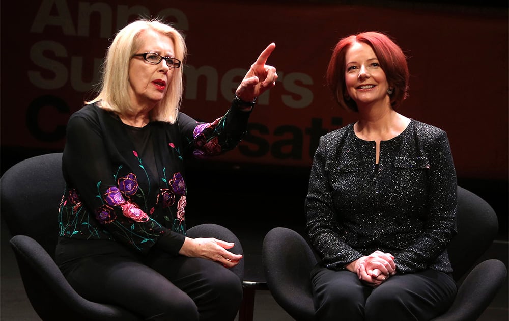 Journalist Anne Summers gestures while she chats with former PM of Australia Julia Gillard prior to an interview at the Opera House in Sydney.