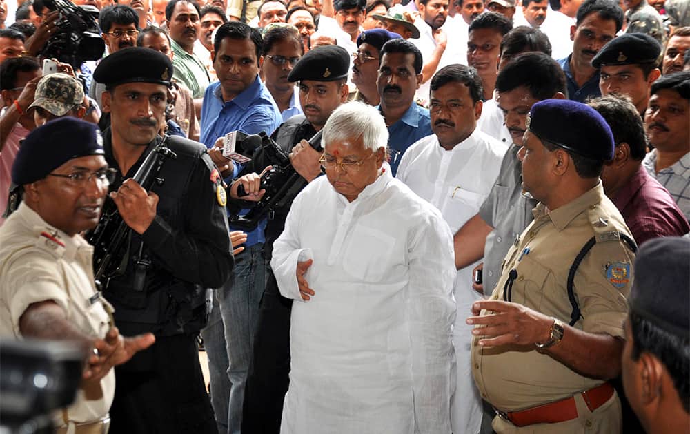 Leader of Rashtriya Janata Dal, Lalu Prasad Yadav arrives at a special court held by Central Bureau of Investigation (CBI) for a verdict on fraudulent transfer of public money, in Ranchi.