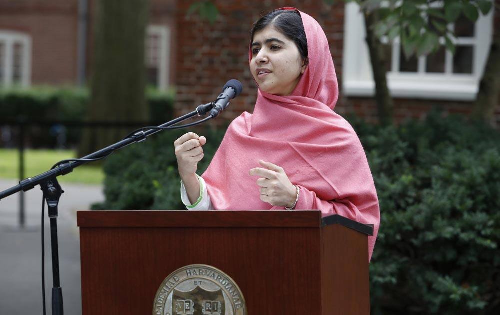 Malala Yousafzai speaks during a news conference on the Harvard University campus in Cambridge, Mass.