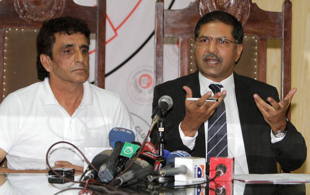 Pakistani cricket umpire Asad Rauf and his lawyer Syed Ali Zafar address a news conference in Lahore. Zafar says Rauf will not be appearing in Indian court over spot-fixing charges as he has no confidence in Mumbai police, who framed charges against the Pakistani umpire.