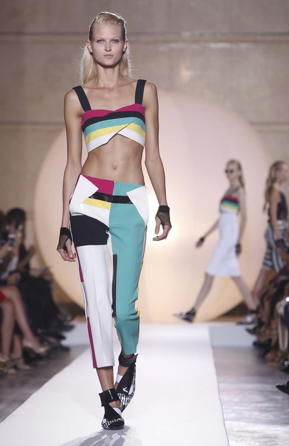 A model wears a creation for French fashion designer Roland Mouret`s ready-to-wear Spring/Summer 2014 fashion collection, presented in Paris.