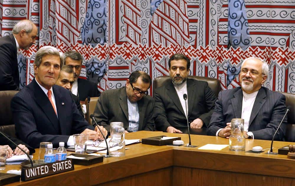 US Secretary of State John Kerry and Iranian Foreign Minister Mohammad Javad Zarif attend a meeting of the five permanent members of the Security Council plus Germany during the 68th session of the United Nations General Assembly at U.N. headquarters.