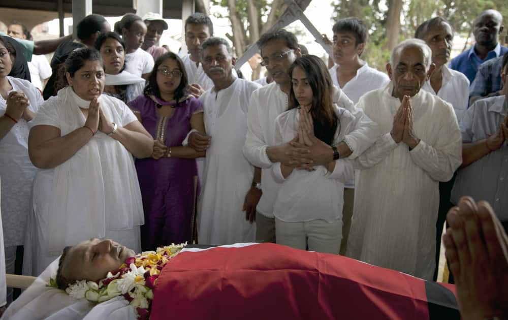 Family members pay their last respect to late Mitul Amritlal Shah, of Bidco Group of Kenya, who was shot dead in the attack on the Westgate Mall, at his funeral at the Hindu Crematorium in Nairobi, Kenya.