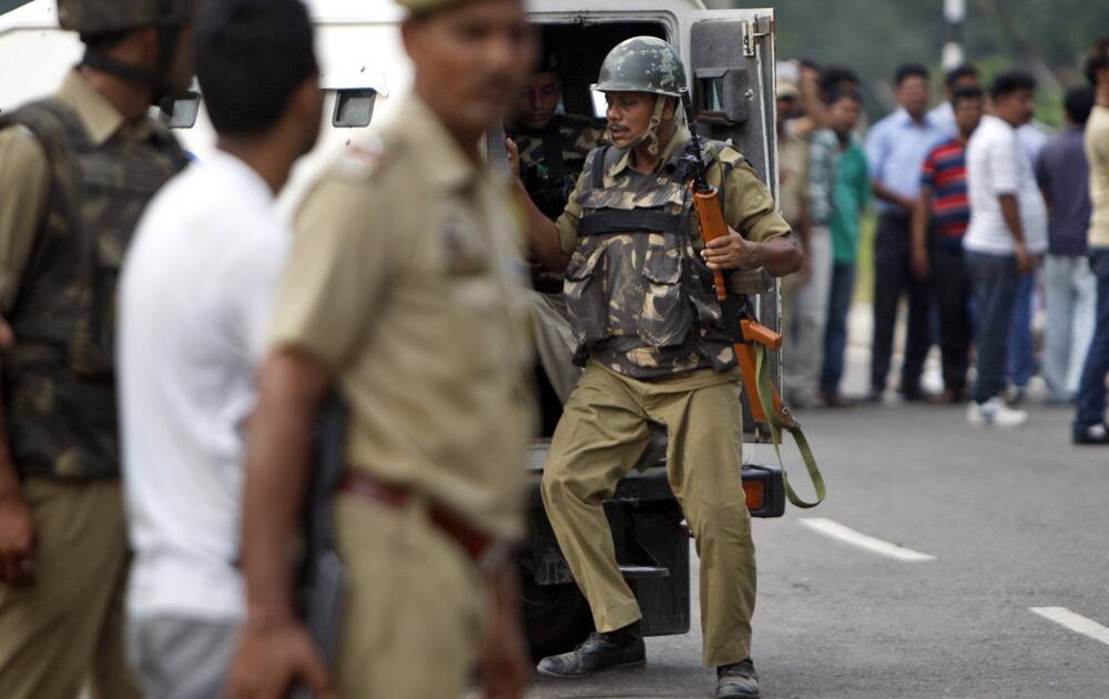 Indian paramilitary soldiers arrive at the site of a terrorist attack at an army camp in Samba, about 40 kilometers (25 miles) from Jammu.