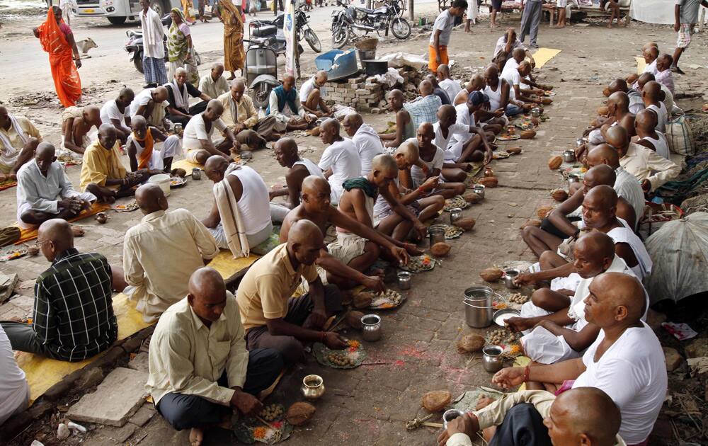 Hindu devotees perform