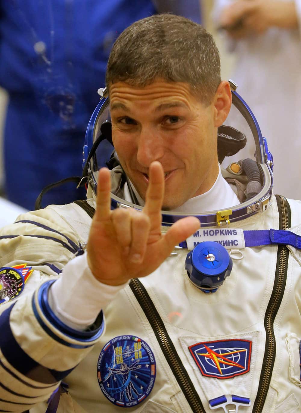 US astronaut Michael Hopkins, crew member of the mission to the International Space Station, ISS, gestures prior the launch of Soyuz-FG rocket at the Russian leased Baikonur cosmodrome, Kazakhstan.