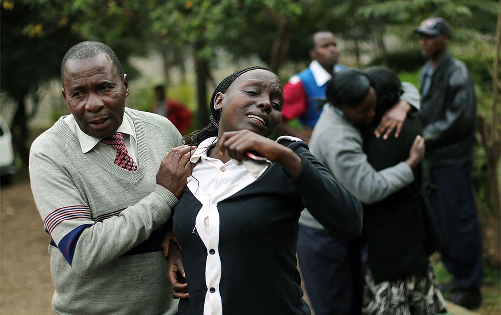 Relatives of Johnny Mutinda Musango, 48, weep after identifying his body at the city morgue in Nairobi, Kenya.