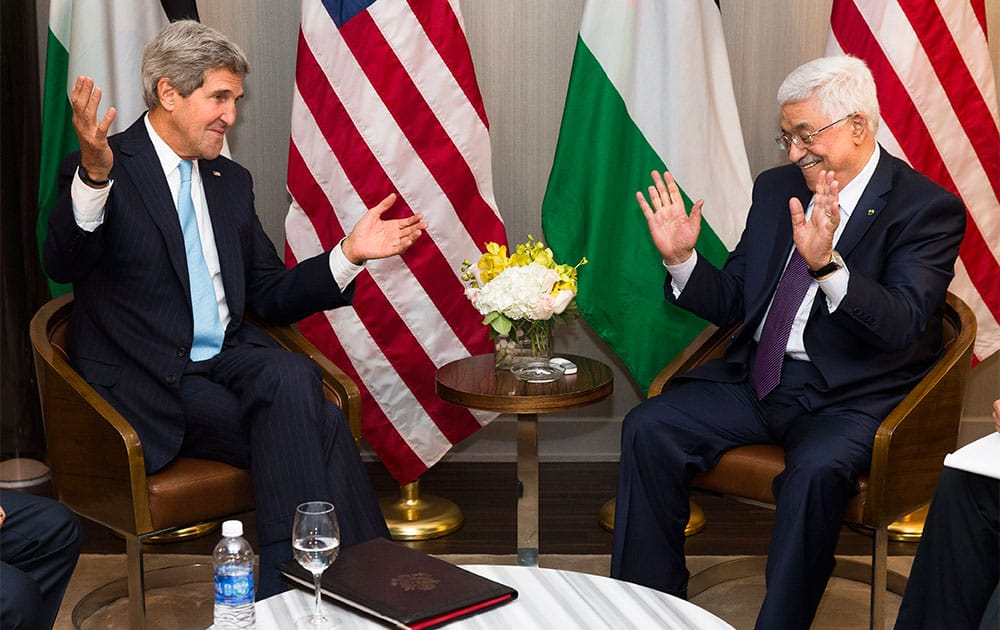Secretary of State John Kerry, left, meets with Palestinian Authority President Mahmoud Abbas in a bilateral meeting during the 68th session of the United Nations General Assembly, in New York.