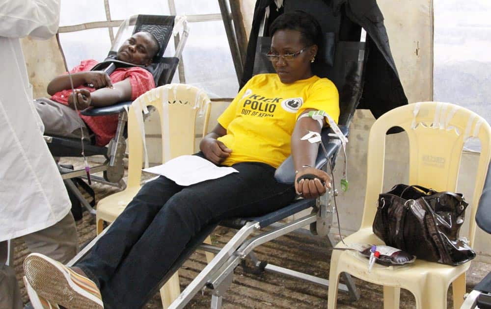 People donate blood for injured persons in an attack at the Westgate Mall, at Uhuru Park in Nairobi.