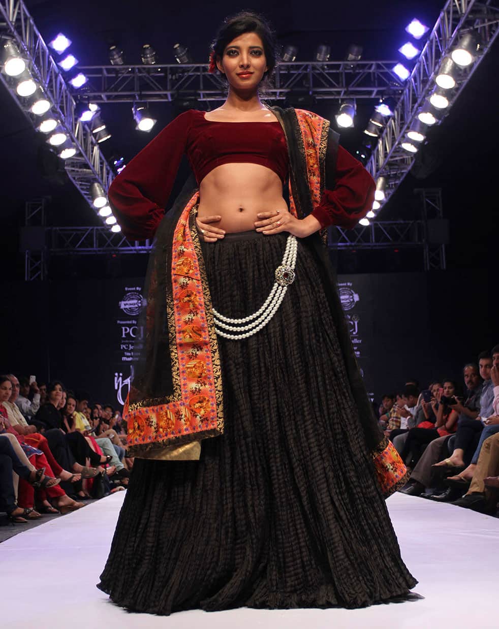 A model displays a creation by Sonia Mehra during the India Jewelry and Fashion Week in Ahmadabad.