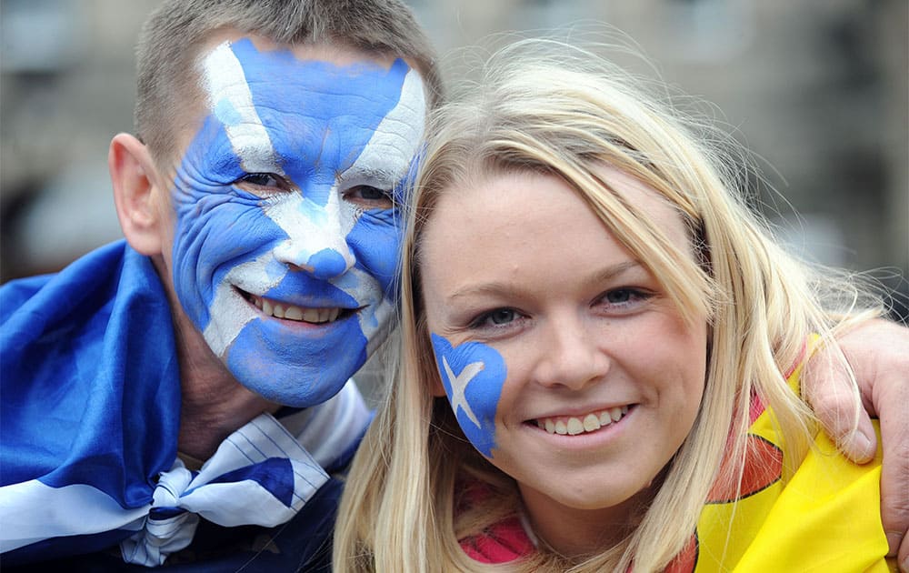 John Carroll and Stefanie (surname not given) from North Lanarkshire during a march and rally in Edinburgh, calling for a Yes vote in next year`s independence referendum.