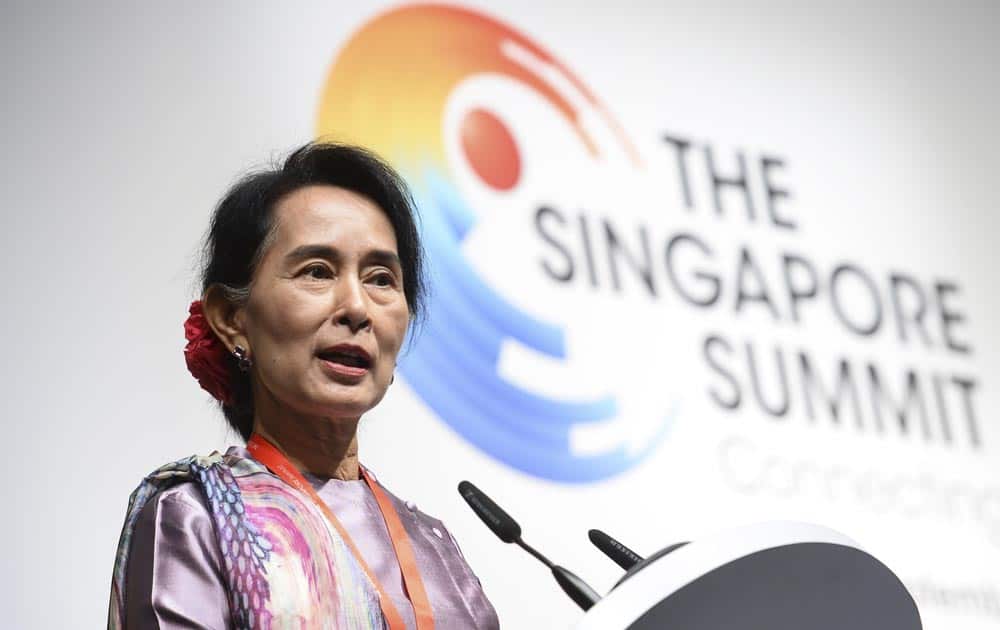 Myanmar opposition leader Aung San Suu Kyi delivers her keynote speech during the Singapore Summit in Singapore.