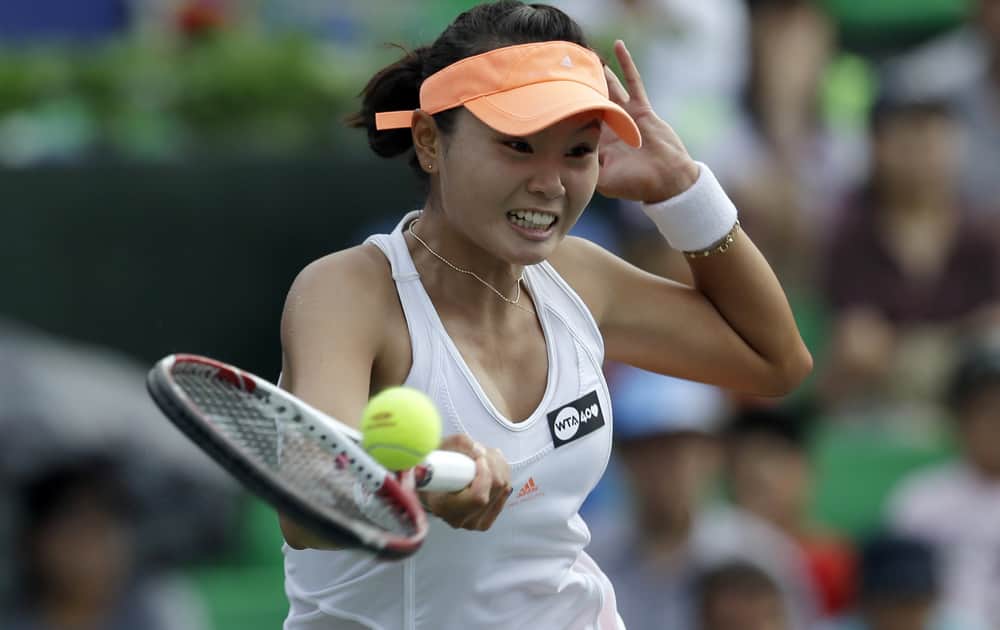 Jang Su-jeong of South Korea returns a shot against Lara Arruabarrena of Spain during the quarterfinal match of the Korea Open tennis championships in Seoul, South Korea.