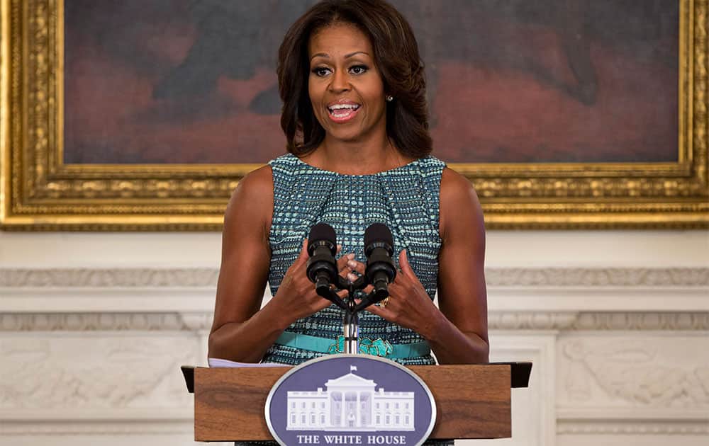 First lady Michelle Obama gestures during an event about food marketing to children in the State Dining Room of the White House in Washington.