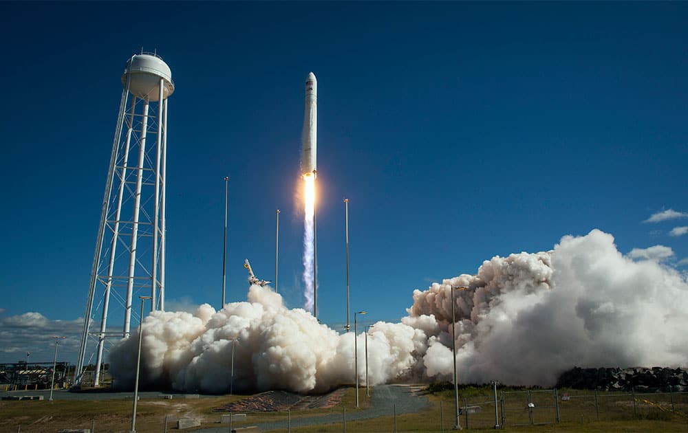 In this photo provided by NASA, the Orbital Sciences Corp. Antares rocket lifts off the launchpad at the NASA Wallops Island test flight facility in Wallops Island, Va.