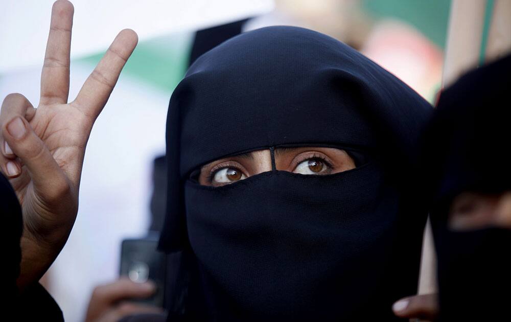 Palestinian women supporters of Hamas chant slogans during a demonstration a protest calling to reopen the Rafah border crossing in Rafah, southern Gaza Strip.