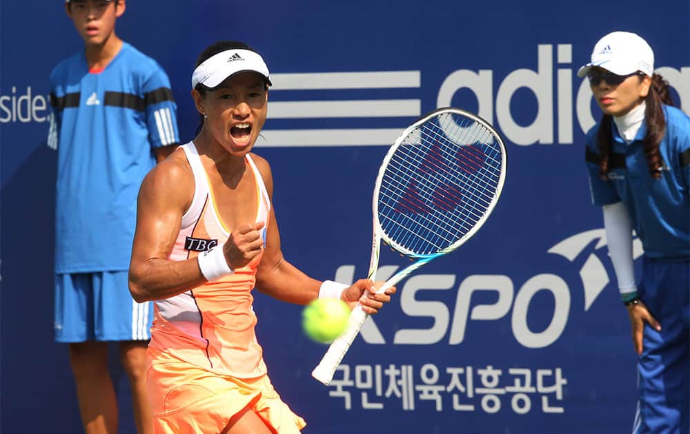 Japan`s Kimiko Date Krumm shouts after winning against Great Britain`s Heather Watson during the first round match of the Korea Open tennis championships in Seoul, South Korea. Date Krumm won the match with 3-6, 6-3, 6-4.