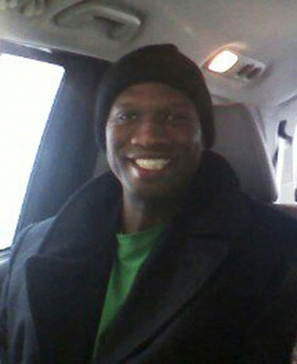 This undated cell phone photo provided by Kristi Kinard Suthamtewakul shows a smiling Aaron Alexis in Fort Worth, Texas. The FBI has identified Alexis, 34, as the gunman in the Monday, Sept. 16, 2013 shooting rampage at at the Washington Navy Yard in Washington that left thirteen dead, including himself.