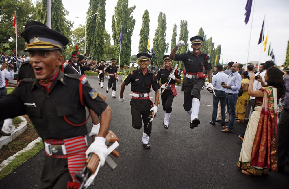 Cadets celebrate after a graduation ceremony at Officers Training Academy in Chennai. A total of 350 cadets graduated and will be posted as Lieutenants in the Indian Army.