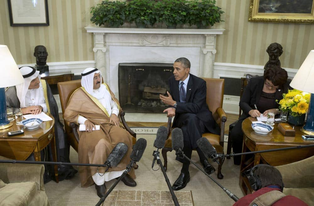 President Barack Obama talks with the Kuwait Amir Sheik Sabah Al Ahmed Al Sabah during their meeting in the Oval Office of the White House in Washington.