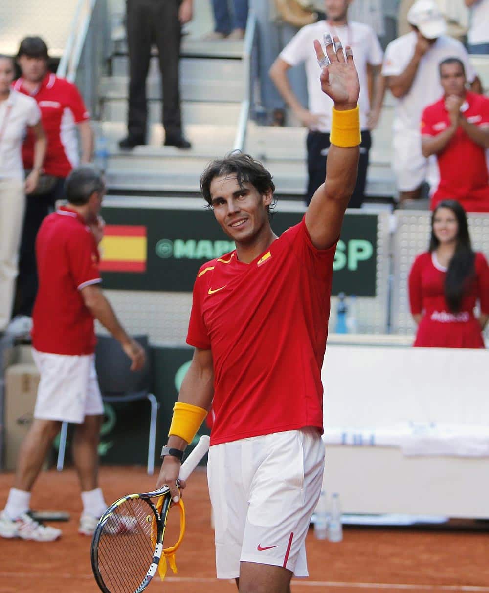 Spain`s Rafael Nadal celebrates his victory during a match against Ukraine`s Sergiy Stakhovky on the first day of the World Group play-off Davis Cup tennis in Madrid.