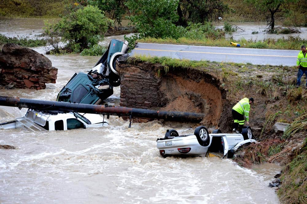A bridge collapse after flash flooding on a business access road at Highway 287 and Dillon Road at the Broomfield/Lafayette border, Colo.