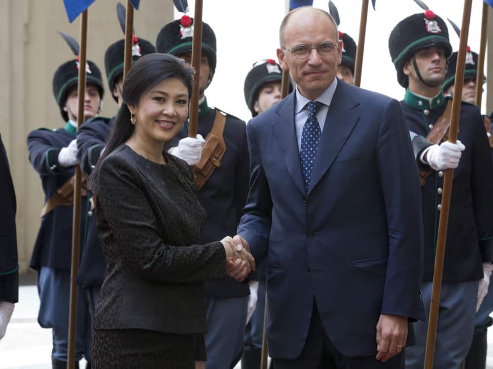 Italian Premier Enrico Letta and Thailand`s Prime Minister Yingluck Shinawatra shake hands for the media ahead of their meeting in Rome`s Chigi Government Palace.