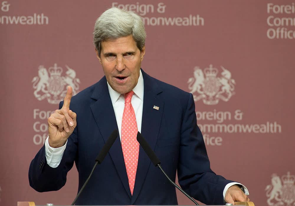 Secretary of State John Kerry gestures during a press conference with Britain Foreign Secretary William Hague at Foreign Office in London. Until recent days Kerry has been the Obama administration point person in arguing that Syria`s alleged use of chemical weapons justifies a US attack.