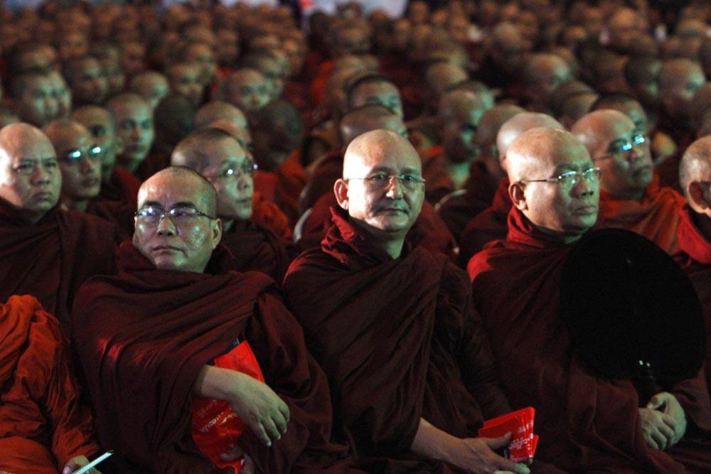 Myanmar Buddhist monks attend a celebration to mark the 74th death anniversary of monk U Ottama at Myanmar Convention Center.