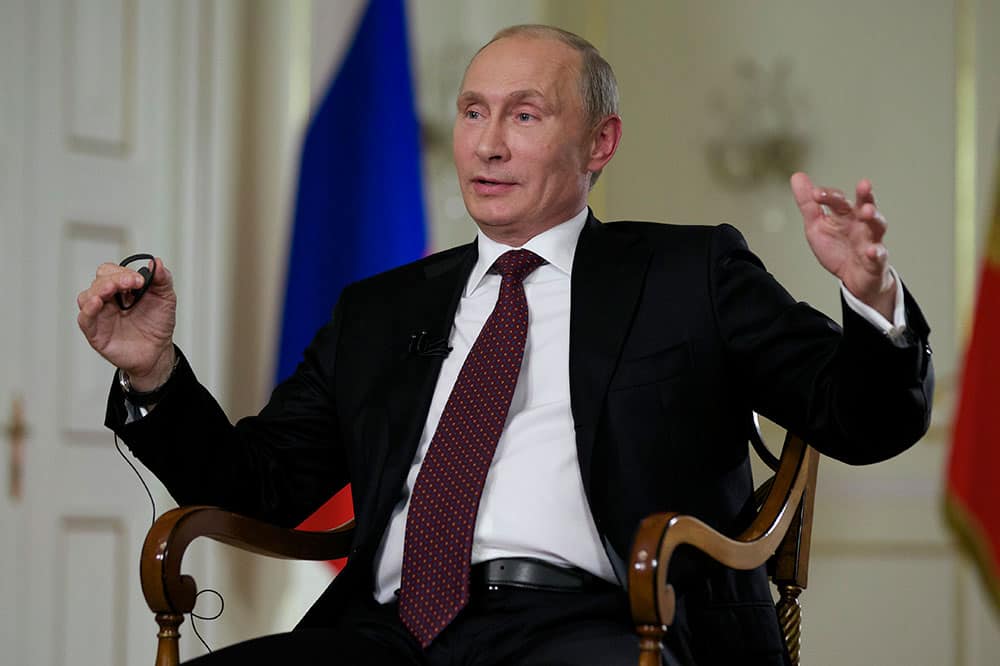 Russian President Vladimir Putin gestures while speaking to John Daniszewski, the Associated Press`s Senior Managing Editor for International News, during an AP interview at Putin`s Novo-Ogaryovo residence outside Moscow.
