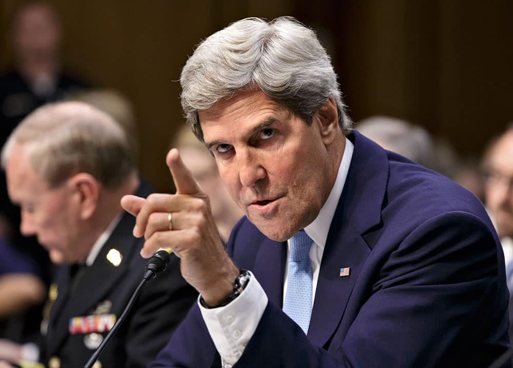 Secretary of State John Kerry shows frustration at questioning from Sen. Rand Paul, R-Ky., at a Senate Foreign Relations Committee hearing about President Barack Obama`s request for congressional authorization for military intervention in Syria, a response to last month`s alleged sarin gas attack in the Syrian civil war, on Capitol Hill in Washington.
