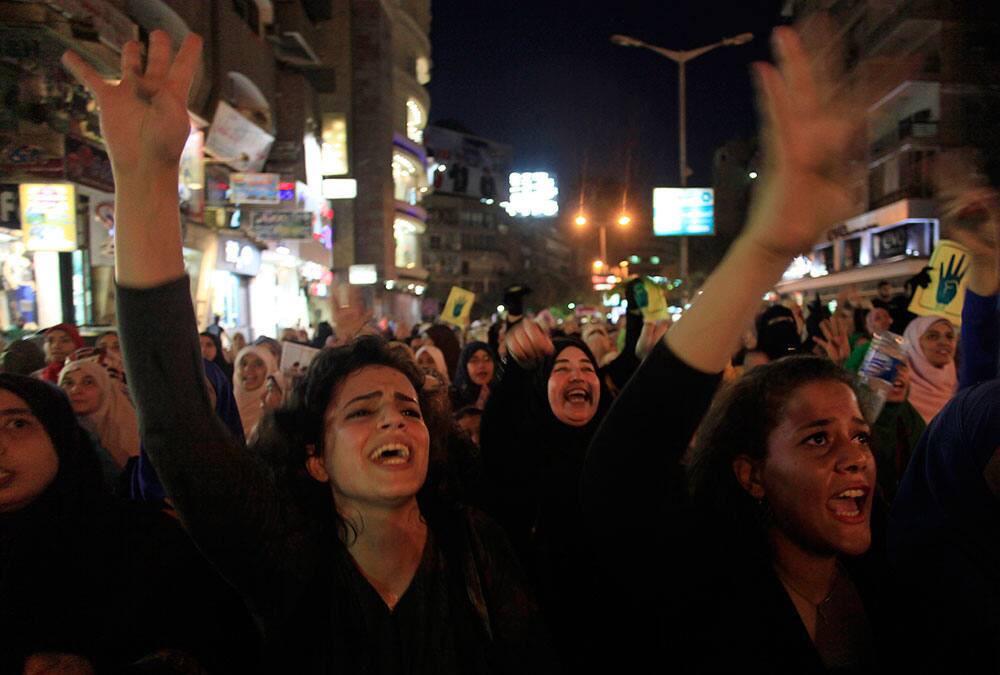 Supporters of Egypt`s ousted President Mohammed Morsi, chant slogans during a protest in Cairo, Egypt.