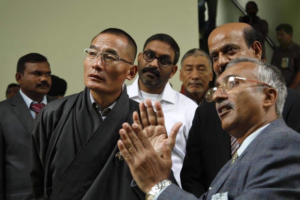 Bhutanese Prime Minister Lyonchhen Tshering Tobgay, listens to officials during his visit to the Confederation of Indian Industry (CII) Godrej Green Business Centre in Hyderabad. Tobgay is in India on a five day official visit.