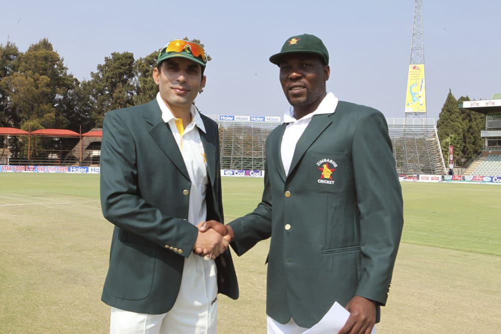 Pakistan captain Misbah Ul Haq, shakes hands with Zimbabwean captain Hamilton Masakadza before the first test match against Zimbabwe at Harare Sports Club in Harare. Pakistan is in Zimbabwe to play test matches against the hosts.