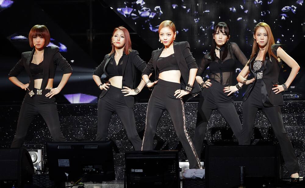 South Korean girl pop group KARA performs to promote their new album