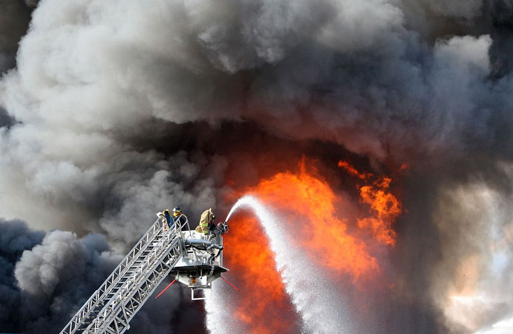 No injuries were reported in a blaze at the Dietz and Watson food distribution plant in Delanco, New Jersey. Dozens of firefighters battled the blaze which started on the roof and quickly spread, seriously damaging the massive building in Burlington County.