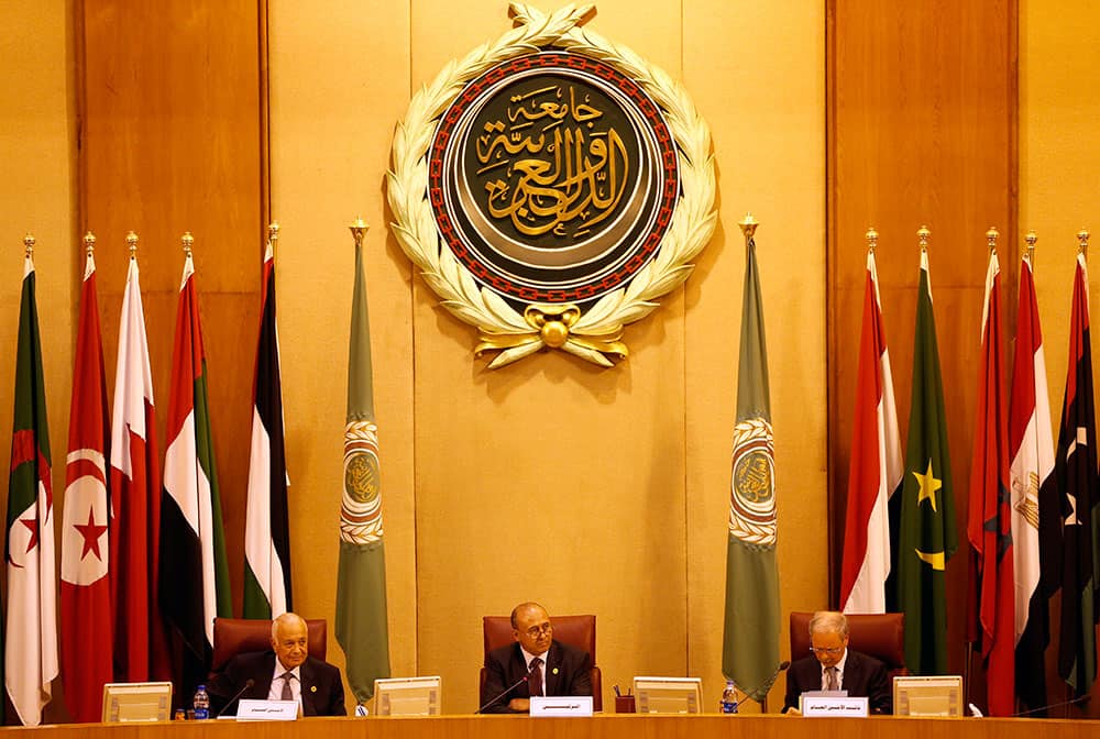 Libyan Foreign Minister Mohamed Abdulaziz, center, leads the Arab countries foreign ministers summit at the Arab League headquarters in Cairo, Egypt.