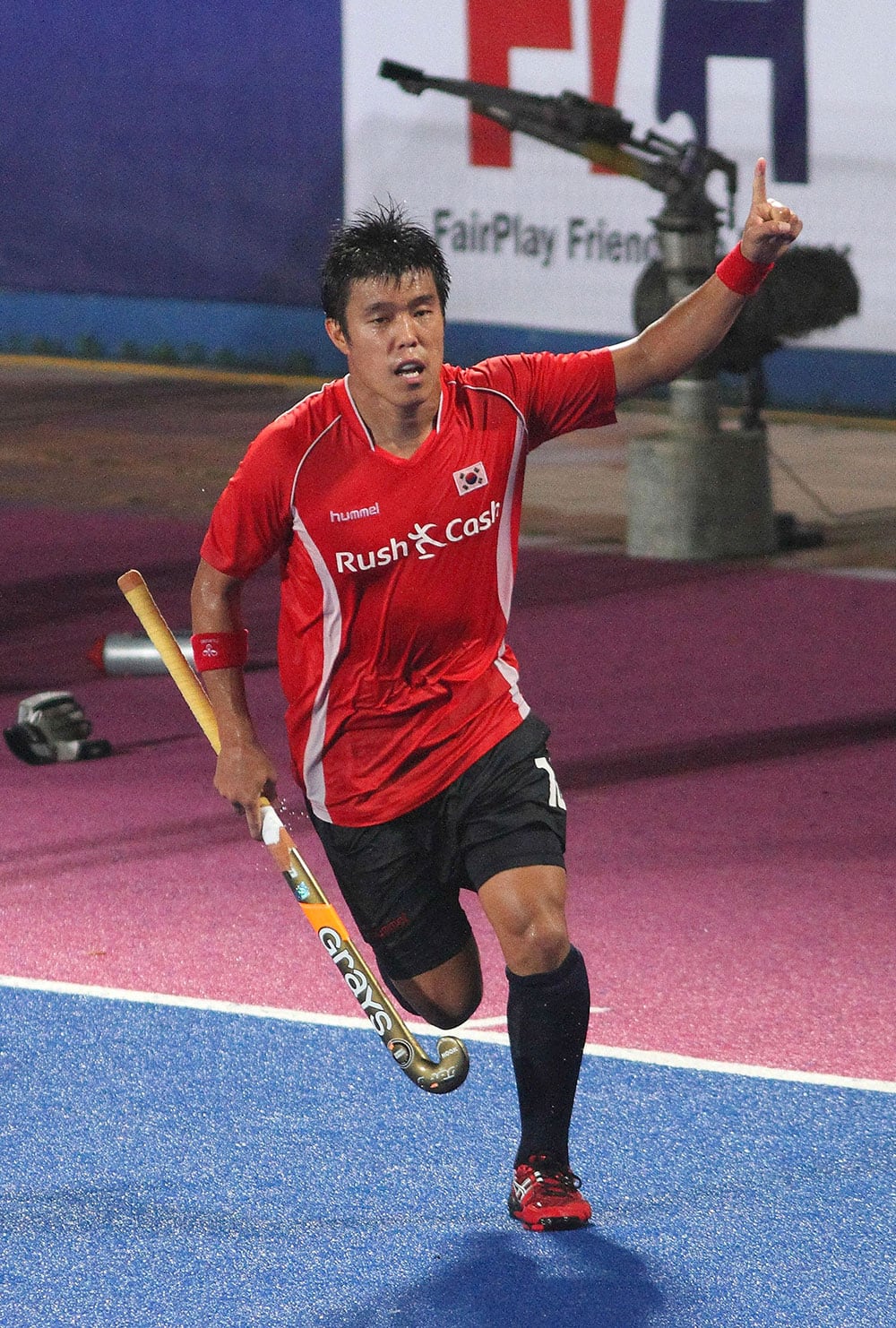 South Korea`s You Hyo-sik celebrates after scoring the second goal against India during their final match of the 9th men`s Asia Cup field hockey tournament in Ipoh, Malaysia.