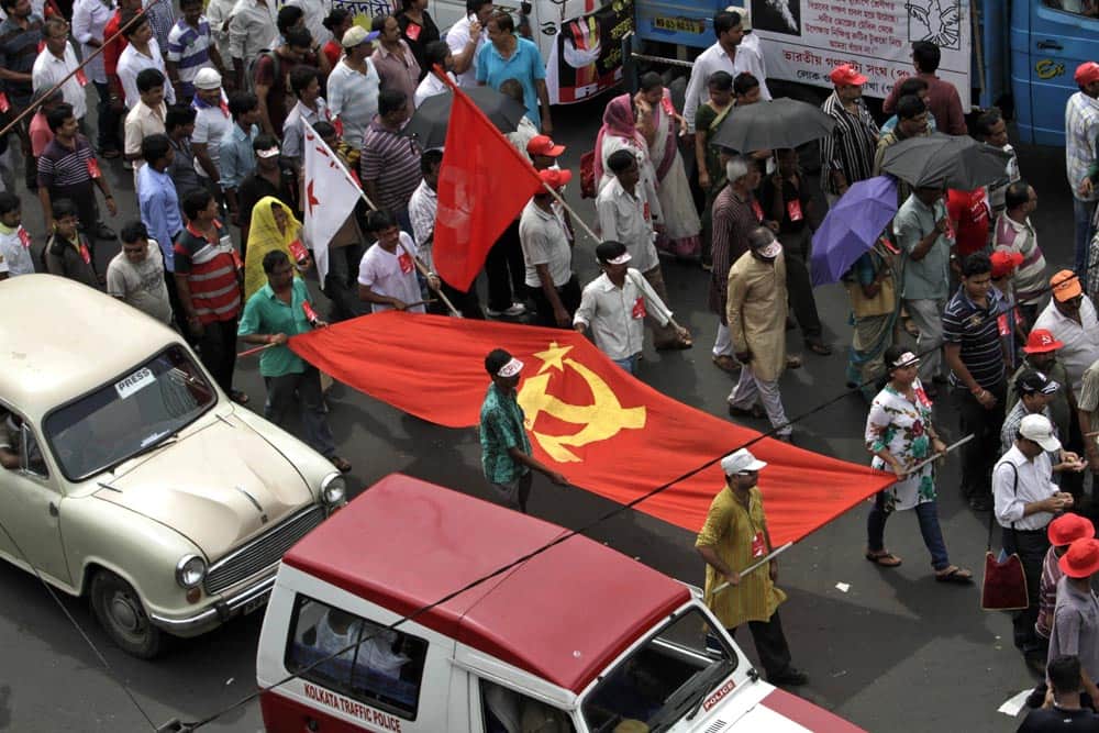 Activists of the left parties and their allies participate in a peace rally to mark the anniversary of the 1939 Nazi Germany`s invasion of Poland, in Kolkata.
