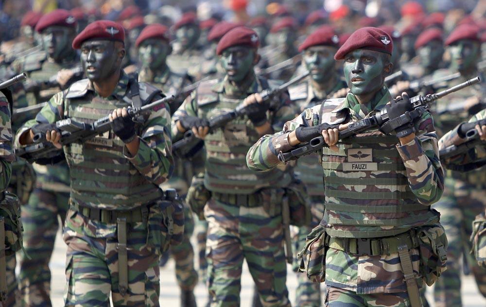 Members of the Malaysian armed forces march during the 56th National Day celebrations at Independence Square in Kuala Lumpur, Malaysia.