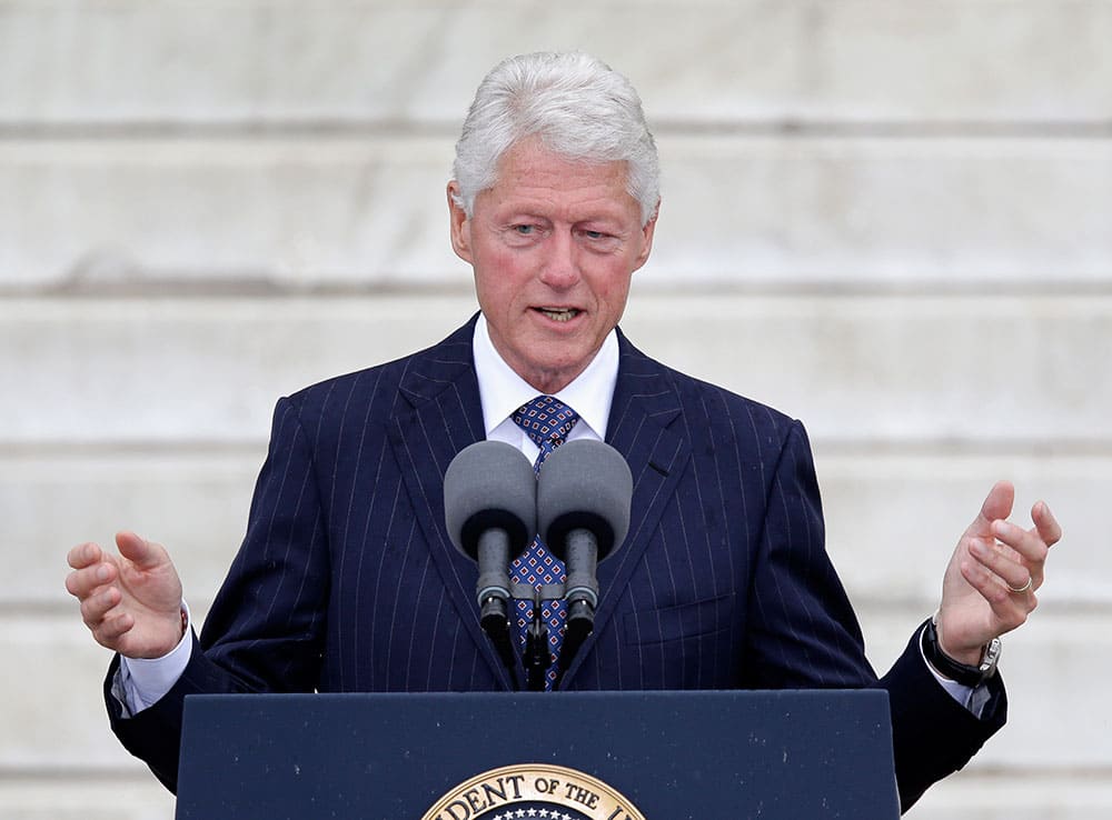 Former President Bill Clinton speaks at the Let Freedom Ring ceremony at the Lincoln Memorial in Washington to commemorate the 50th anniversary of the 1963 March on Washington for Jobs and Freedom.