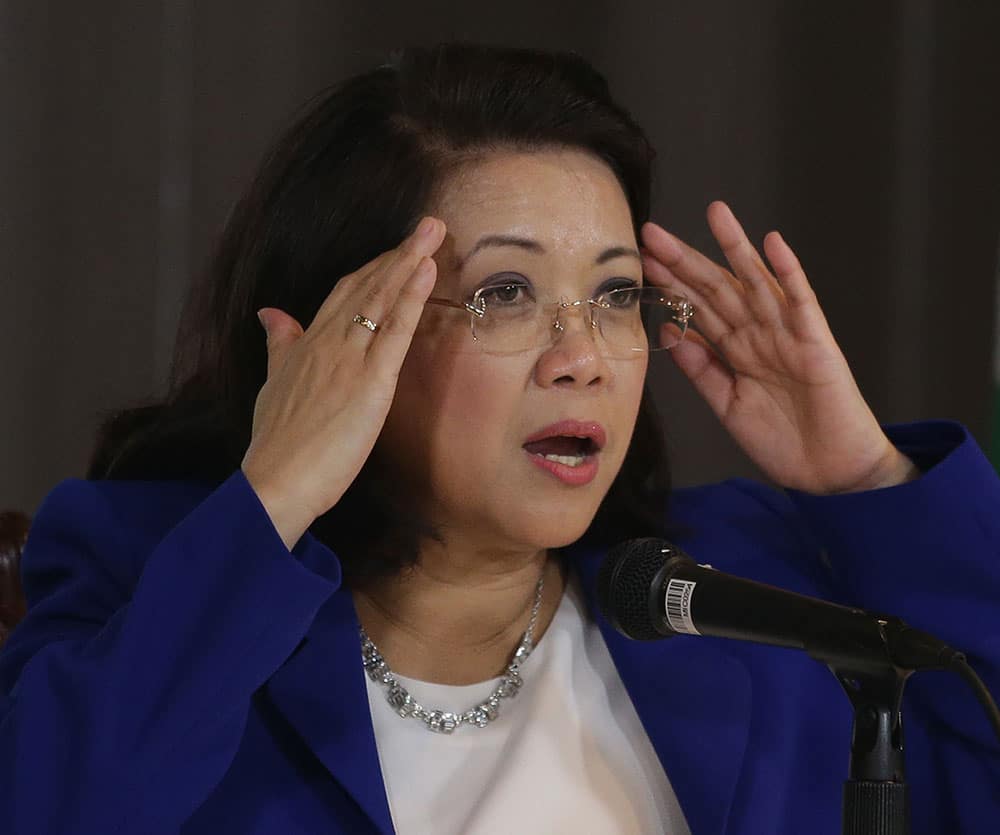 Philippine Chief Justice María Lourdes Sereno gestures during a rare press conference in Manila, Philippines.
