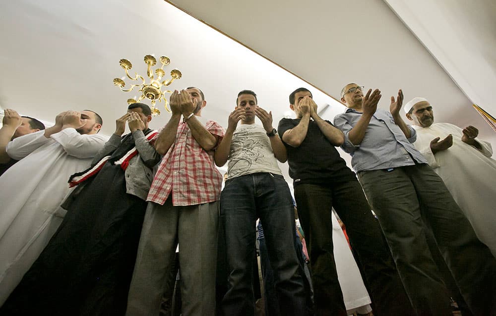 Members of a Muslim congregation pray during a Jumu`ah prayer service at the Islamic Society of Bay Ridge mosque on Friday, Aug. 16, 2013 in the Brooklyn borough of New York.