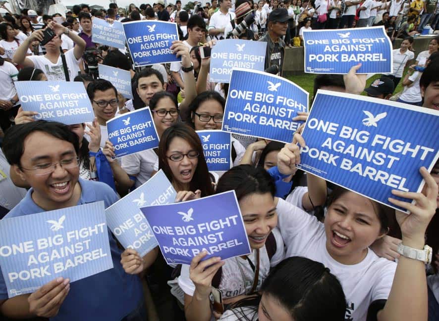 Students shout slogans during a rally at Rizal Park, in Manila, to call for the scrapping of a corruption-tainted development fund known as pork barrel, that allows lawmakers to allocate government money for projects in their districts.