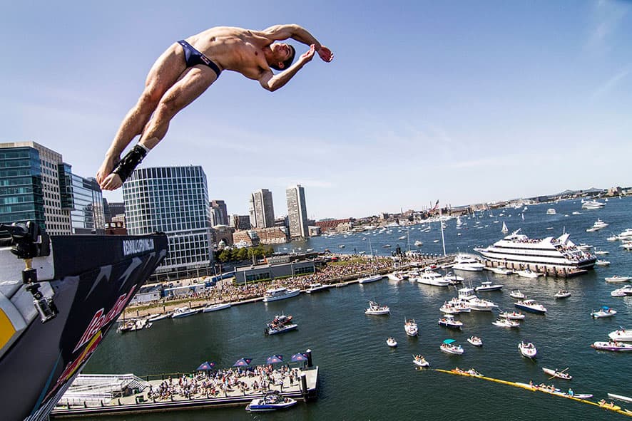 David Colturi of the USA dives from the 27.5 meter platform on the ICA building during the fifth stop of the Red Bull Cliff Diving World Series in Boston.